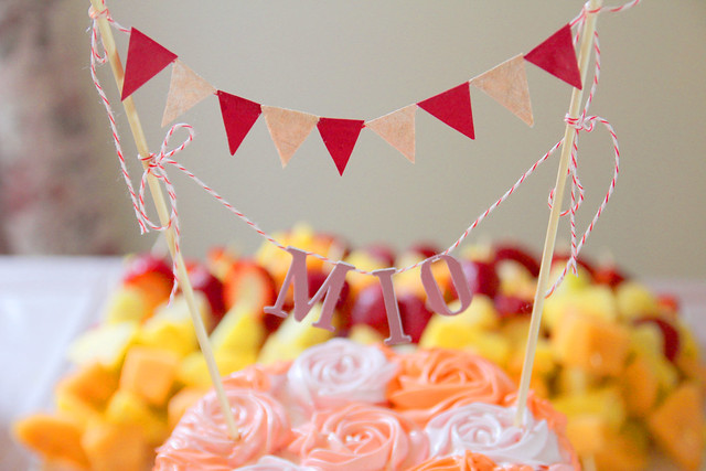 Homemade bunting and lettering cake topper.