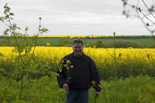 Dad Picking Rapeseed Flowers for Mom