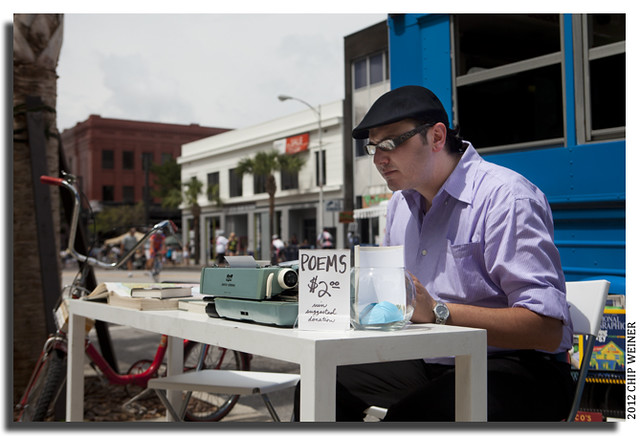 As part of the fun downtown and in commemoration of National Poetry Month, IV Poets' David Durney wrote a poem on the spot, soliciting passersby for just two words, two bucks and taking it from there.