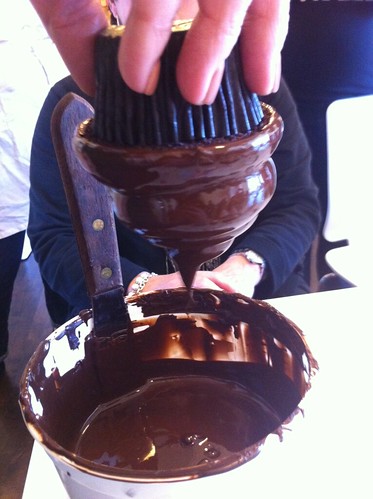 Yes, this is a hi hat cupcake freshly dipped in chocolate by Rachel from Cupcakes Take the Cake