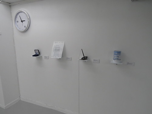 Kanslibyrån: Office Clock + Medal of merit + Edible rejection + Modified pen + Donations box