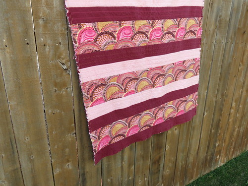 rag quilt on fence