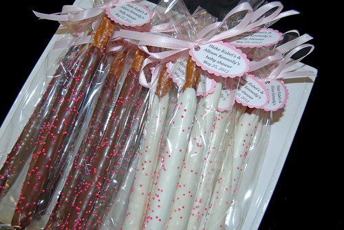 chocolate dipped pretzels pink baby shower favors