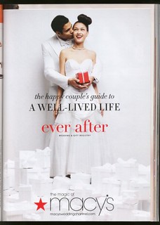A Macy's wedding ad showing a straight couple surrounded by packages