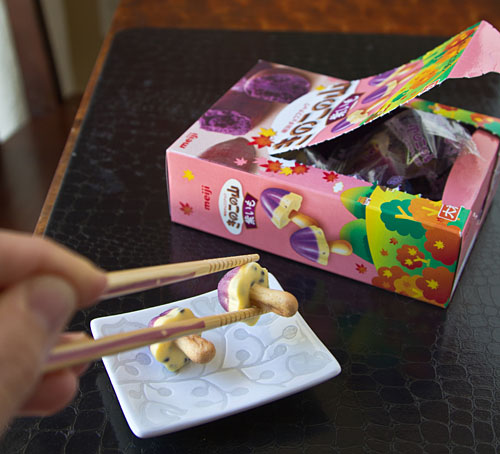 eating candy with chopsticks