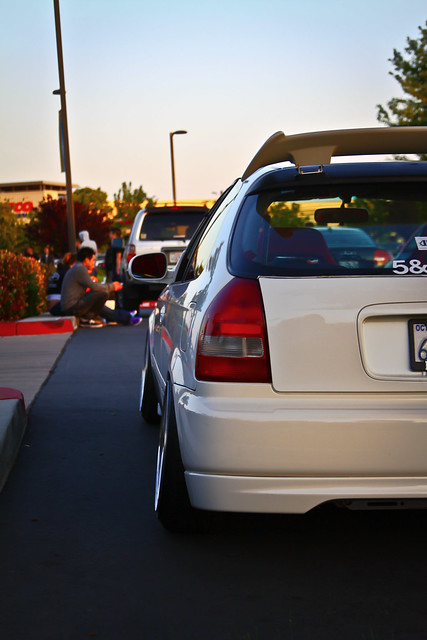 A slammed Honda Civic with many Type R mods