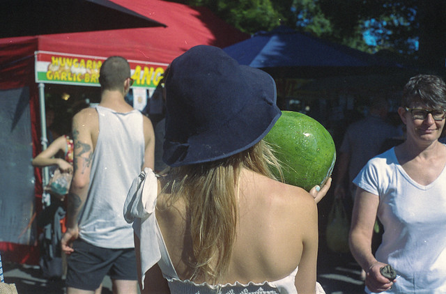 Lady carrying watermelon