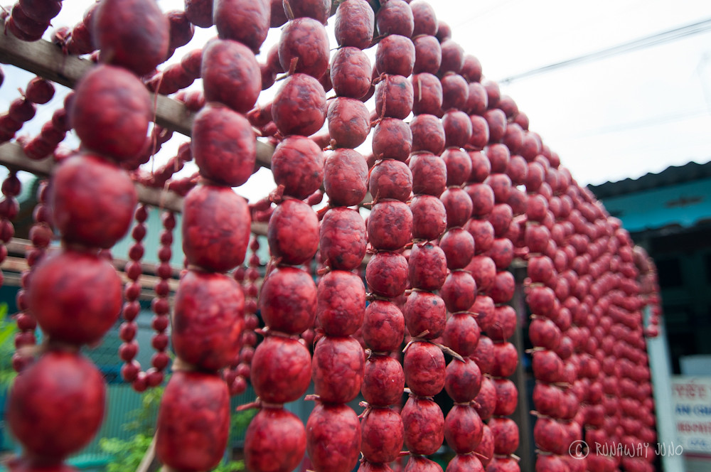 Drying the homemade sausages in Chau Giang