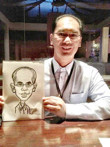 caricature live sketching for Westminister Travel (S) Pte Ltd