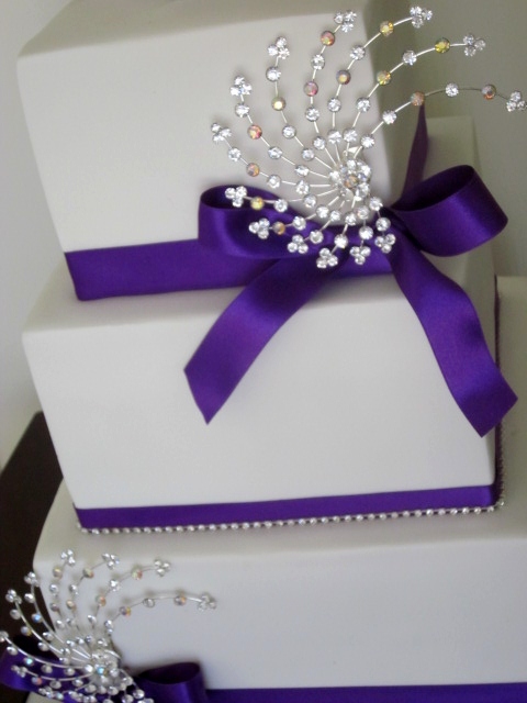 White and Purple Bling Wedding Cake It 39s amazing how adding a stunning