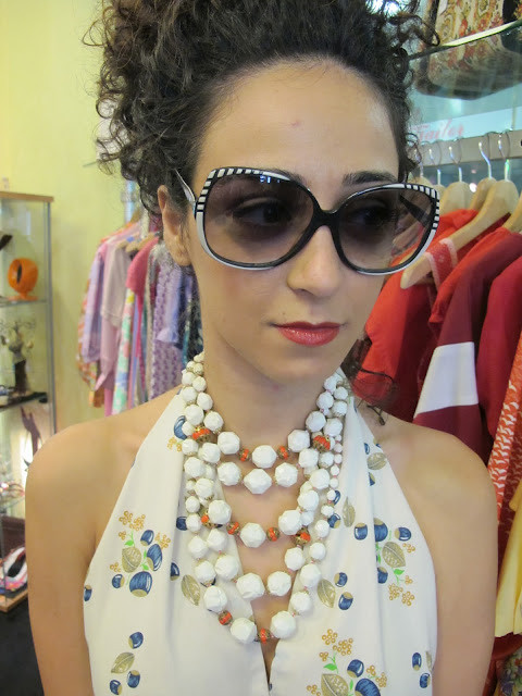  Fabulous 1950s beads, 1980s Hilite sunglasses and 1970s printed halter top from Granny's Day Out.