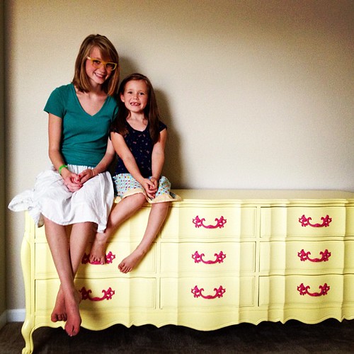 Hazel and Aspen are so excited for their new room. Aspen painted this dresser for the two of them.  I love the yellow and hot pink handles.