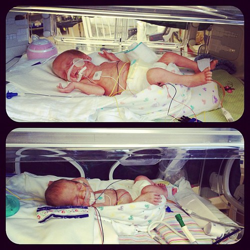 Twins! Both chilling in their pods with their legs hangings out. #twins #preemie