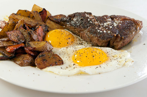 steak, eggs, potatoes