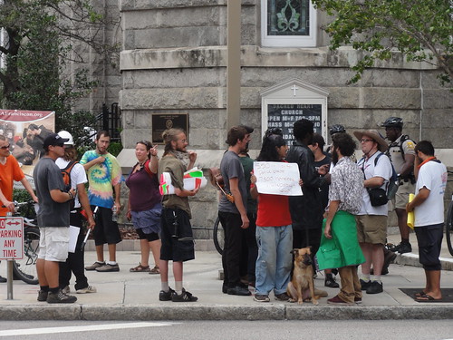 Close-up of protesters in front of Sacred Heart Church