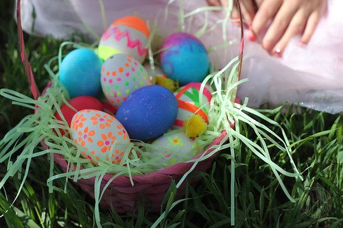 basket filled with painted and decorated Easter eggs 