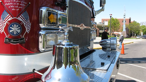 The shiny and well maintained front of an Elmwood Park ariel boom tower fire truck. Elmwood Park Illinois USA. Early April 2012. by Eddie from Chicago