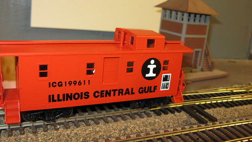 Orange 1970's era Illinois Central Gulf Railroad side door caboose. by Eddie from Chicago