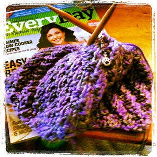 Sunday #knitting and #reading fun! #yarn #cowl #rachaelrayeveryday #getyourkniton
