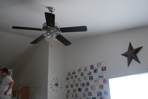 new fan in living room with bare bulbs