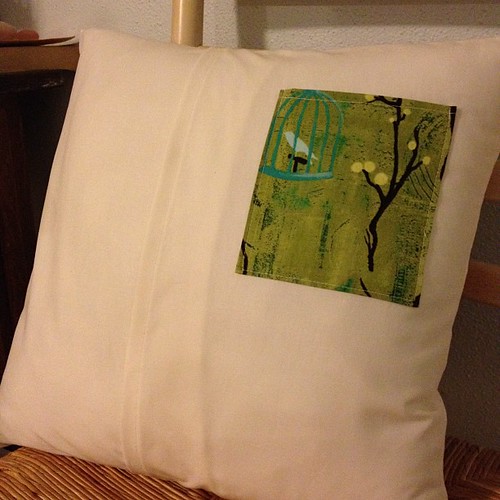 Back of the pillow with a pocket (of course!) to hold photos.