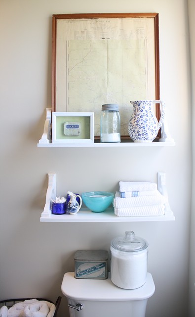 Vintage inspired bathroom shelves with map