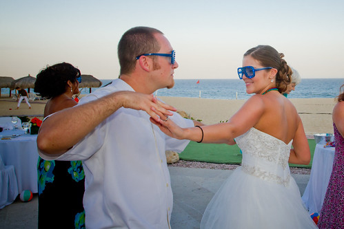 bride and groom dancing with shutter shades on