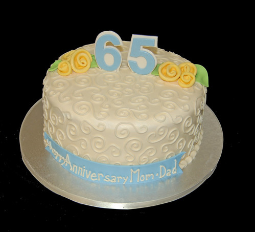 cream and yellow 65th wedding anniversary cake