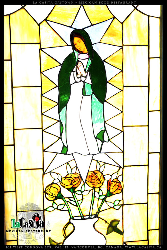 Kinda saint in flowers - stained glass.