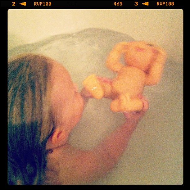 I think she's subjecting baby to swim lessons.... #safestart style