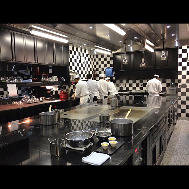 I love the black and white checkered Robuchon kitchen!