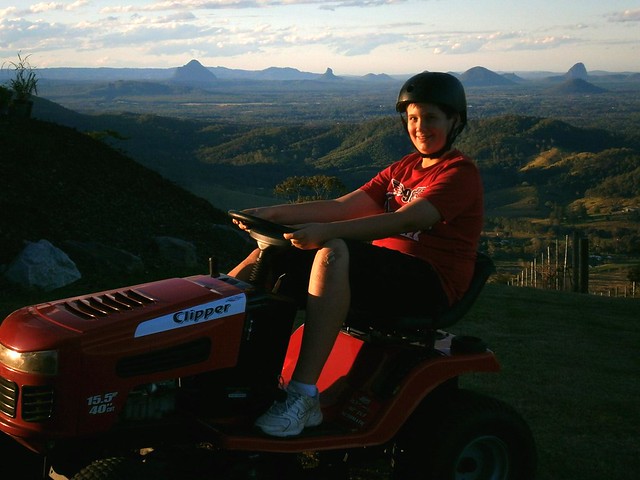 Harrison Riding the Mower