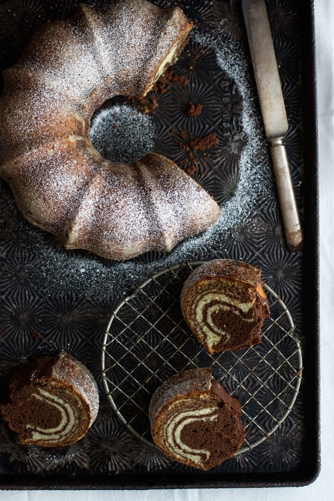 Zebra Bundt Cake - layers of vanilla and chocolate poundcake alternating to make the most beautiful zebra stripes pattern! #poundcake #zebracake #zebrabundtcake #bundtcake | Littlespicejar.com