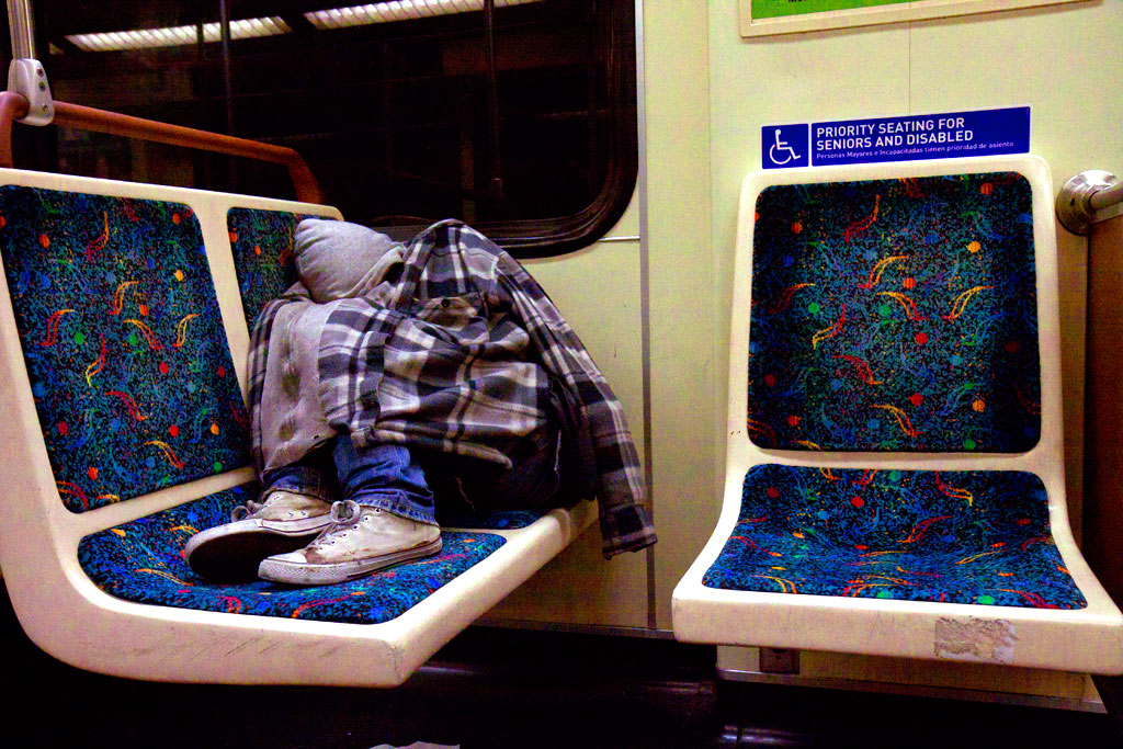 Young-man-sleeping-on-subway-train-in-3-13--Los-Angeles