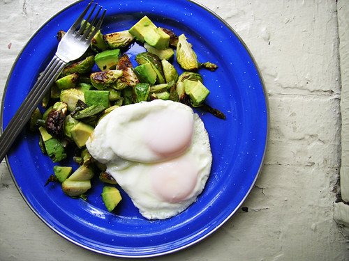 fried eggs with brussels sprout, jalapeno, and avocado hash