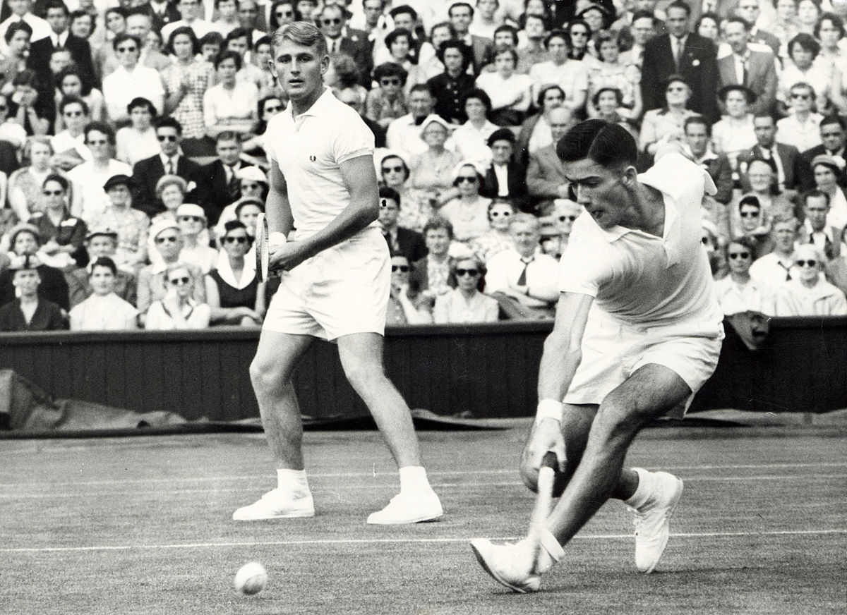 Rosewall (right) and Hoad playing doubles at the Wimbledon Championships in the 1950s