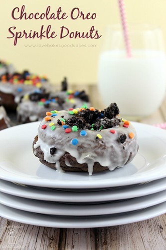 Chocolate Oreo Sprinkle Donut on a stack of plates close up.