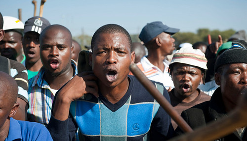 Mineworkers at Lonmin staged a one-day wildcat strike on May 14, 2013. Speculation exists that it is connected to the death of an Association of Mineworkers and Construction Union organizer just days before. by Pan-African News Wire File Photos