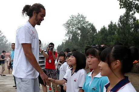June 30th, 2012 - Joakim Noah meets children at a primary school for children of migrant workers at Changping District in Beijing