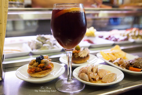 Glass of (excellent) sangria with my spread of tapas