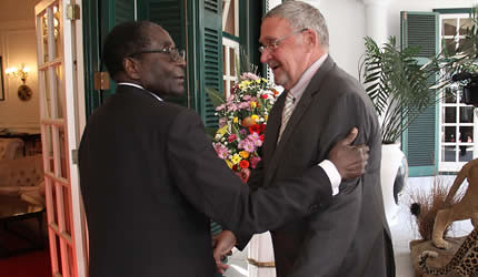 Zambian Vice-President Guy Scott welcomed to Zimbabwe by President Robert Mugabe. They discussed a grain deal between the two Southern African states. by Pan-African News Wire File Photos