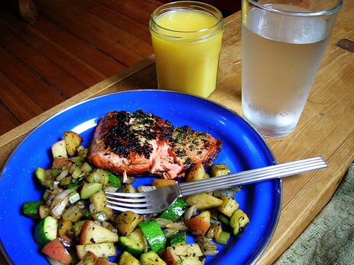 salmon with apple fennel zucchini hash, orange juice, and water