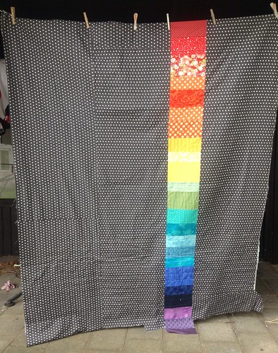 Background of Dresden flower quilt. Lots of polka dots and a rainbow...