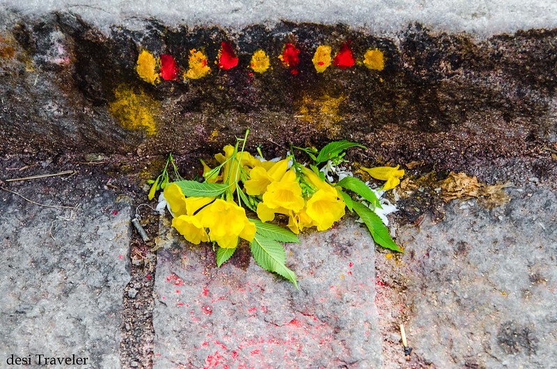 yellow flowers offered at the beginning of stairs Mahakali Temple Golconda