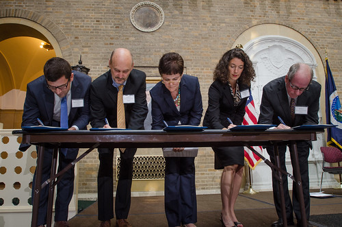 U.S. Department of Agriculture (USDA) Bioenergy Memorandum of Understanding is signed by wood energy partners (left - right) Biomass Thermal Energy Council, Executive Director Joseph Seymour; Alliance for Green Heat, President John Ackerly; USDA Deputy Agriculture Secretary Krysta Harden; Pellet Fuels Institute Executive, Director Jennifer Hedrick; Biomass Power Association, President and CEO Bob Cleaves, at the USDA Headquarters in Washington, D.C. on September 11, 2013. USDA Photo by Lance Cheung.
