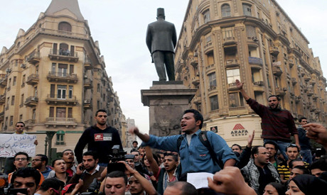 Egyptian demonstrate against new laws to restrict political activity under the military regime. This march took place on November 27, 2013. by Pan-African News Wire File Photos