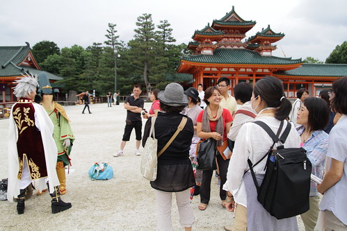 Cosplayers surrounded by tourists at Heian Shrine
