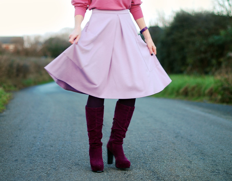 Pink sweater, lilac midi skirt & magenta boots