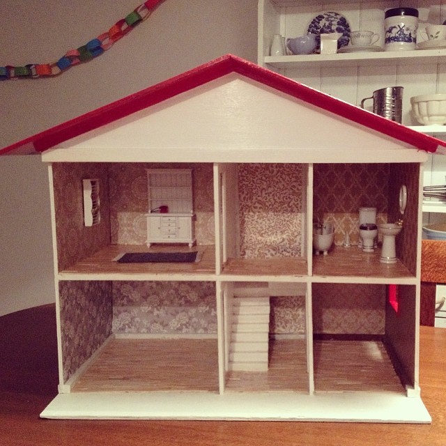 1,000 mini paddle pop sticks, one whole bottle of PVA glue and three days later, and the doll house renovation is finished, ready in time for Emerson's 2nd birthday tomorrow. Phew! #dollhouse #renovation #acertaintypeofcrazy