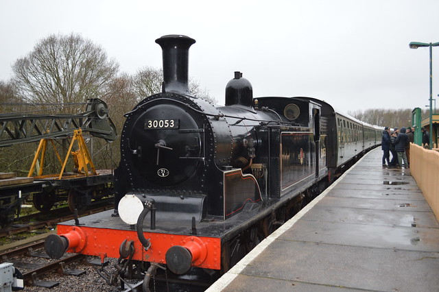 a picture of a steam train on swanage railway line